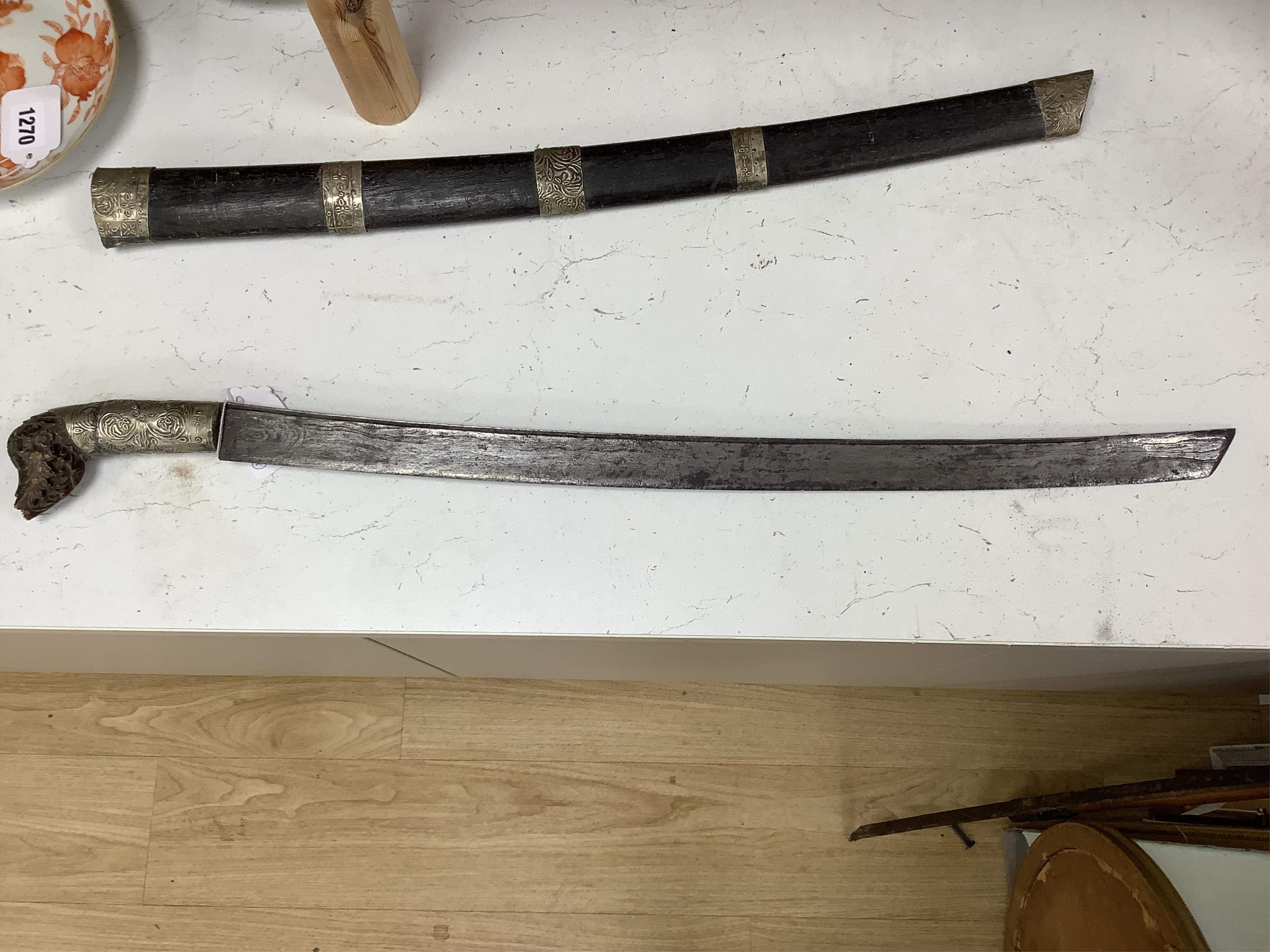 An Indian sword Tulwar, blade 68.5cm. Condition - poor, heavily pitted